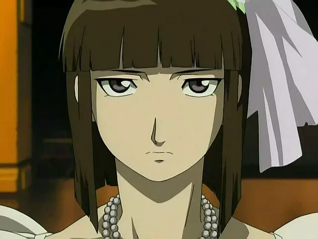 An elegant woman with long dark hair and a composed, calculating expression.